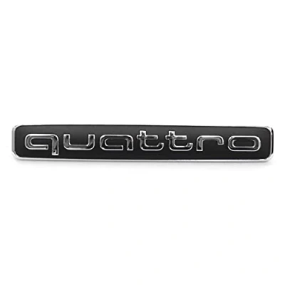 Abbildung von Audi 4K0853736A9B9 Plakette Quattro Schriftzug Kühlergrill Emblem Logo, nur für Fahrzeuge mit Automatischer Distanzregelung (Acc)