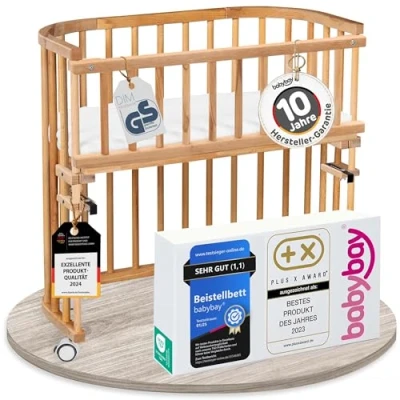 Abbildung von babybay Original Beistellbett aus massivem Buchenholz/kompakt &amp; verwandelbar/Kinderbett Höhe stufenlos verstellbar/mitwachsendes Babybett (Kernbuche geölt) / inkl. Matratze, Gitter, Rollen