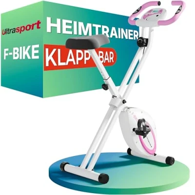 Abbildung von Ultrasport F Bike, Rider Basics, Fahrradtrainer, Fitnessfahrrad LCD Trainingscomputer, Klappbarer Hometrainer, Max. Benutzergwicht 110 kg, Pulsmessung, 8 Widerstandsstufen, Trimmrad, Pink