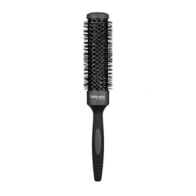 Abbildung von Termix Evolution XL. Thermische Rundhaarbürste mit 3 cm längerem Keramikrohr für langes Haar. Reduziert dank seiner ionisierten Fasern und des Anti Haft Rohrs die Trocknungszeit. Durchmesser: 32 cm.