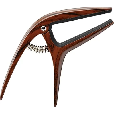 Abbildung von Ibanez ICGC10W guitar Capo For Acoustic, Electric and Classical Single handed operation Wood effect.