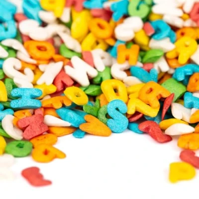 Abbildung von Super Streusel Buchstabensalat Essbare Einschulung Deko zum Schulanfang 60g Buchstaben für Torte als Kuchendeko Zuckerdekor Kuchen Essbar