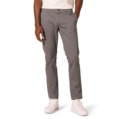 Abbildung von Amazon Essentials Herren Chinohose, Komfortabler, Gewaschener Stretch, Skinny Passform (Früher Goodthreads), Grau, 34W / 34L