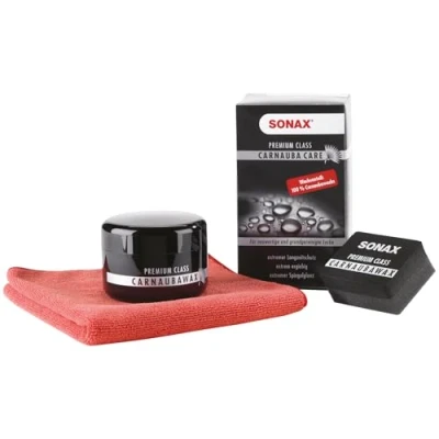 Abbildung von SONAX PREMIUM CLASS Carnauba Care (200 ml) 100% Carnaubawachs für alle neuen &amp; grundgereinigten Lacke inkl. 2x Schwamm 1x MicrofaserTuch Art Nr. 02112000