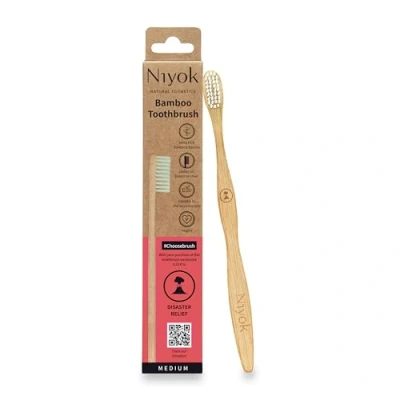 Abbildung von Niyok® Bambus Zahnbürste &quot;KATASTROPHENHILFE&quot; 1er aus Mittelweiche Borsten Natürliche Holzzahnbürste Nachhaltige Zahnbürsten Toothbrush Plastikfrei &amp; Vegan