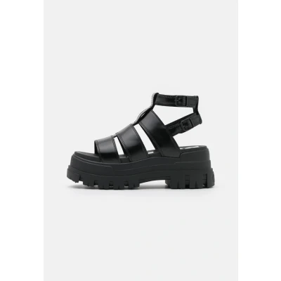 Abbildung von Buffalo Damen ASPHA GLD Flache Sandale, Black, 40 EU
