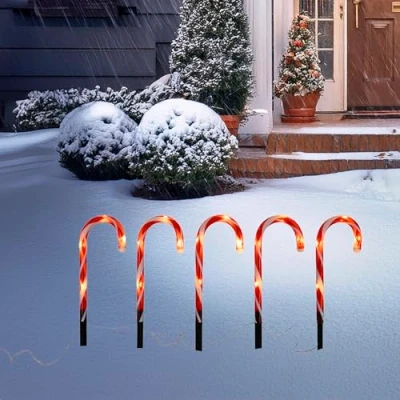 Abbildung von Spetebo LED Zuckerstange Leuchtstecker 39 cm mit Timer 5er Set Weihnachts Gartenstecker warm weiß beleuchtet Batterie betrieben Winter Garten Deko Außen