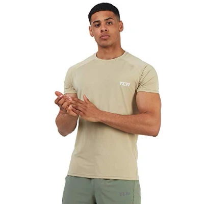 Abbildung von TCA Herren Stamina Laufshirt/Trainingsshirt mit versteckter Reißverschlusstasche Sand, M