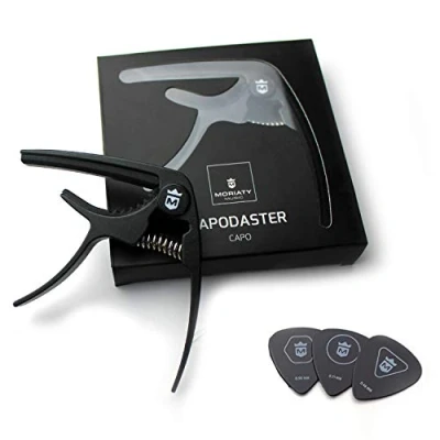 Abbildung von MORIATY® QuickChange Kapodaster für Gitarre + 3 Plektren Gitarrenschule — Extrem robuster Capo Westerngitarre, Akustikgitarre, Konzertgitarre, E Gitarre, Banjo &amp; Ukulele