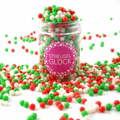 Abbildung von STREUSEL Weihnachten Pure Love Santa 90g weiss rosa rot grün GLÜCK Weihnachtsstreusel Zuckerstreusel Sprinkles Christmas Tortendeko Plätzchen verzieren Kuchenstreusel