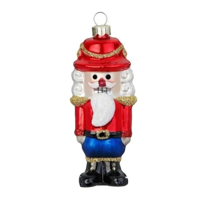 Abbildung von MAGIC by Inge Christbaumschmuck, Christbaumschmuck Glas 9cm Nussknacker Figur Rot / Blau