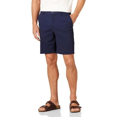 Abbildung von Amazon Essentials Herren 23 cm Lange Stretch Chinohose mit schmaler Passform, Marineblau, 29W