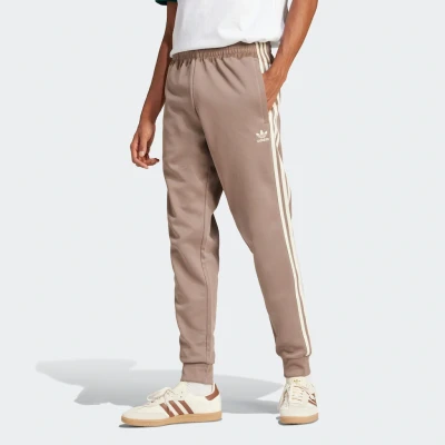Abbildung von adidas Originals SST TP Jogginghose, Herren, Größe: 3XL, Trace brown
