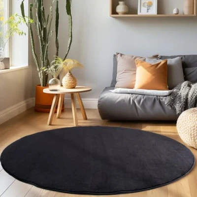 Abbildung von Homebyhome Kurzflor Teppich Wohnzimmer 160 cm Rund Schwarz Waschbarer für Schlafzimmer, Esszimmer und Ideal als Küchenteppich Flauschiger Extra Weich, Einfarbig, Rutschfest, Modern
