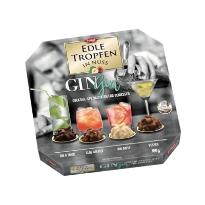 Abbildung von Edle Tropfen in Nuss Gin 100g, flüssig gefüllte Schokoladenpralinen mit Milchschokoladen Überzug und knackigen Haselnuss Splittern