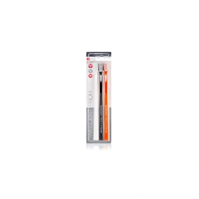 Abbildung von SWISSDENT PROFI GENTLE Zahnbürste, Trio, weiß, schwarz, orange, mit extra weichen Borsten in patentierter Löffelform