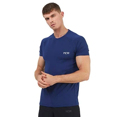 Abbildung von TCA Herren Stamina Laufshirt/Trainingsshirt mit versteckter Reißverschlusstasche Dunkelblau, M