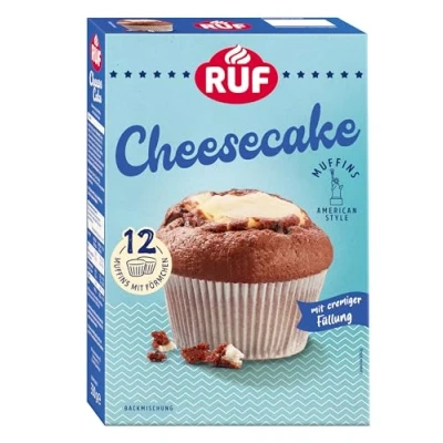 Abbildung von RUF Cheesecake Muffins Backmischung, American Style mit cremiger Füllung, einfache Zubereitung, 12 Muffin Förmchen inklusive