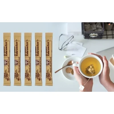 Abbildung von TeeZucker FIVE O&#039;CLOCK 200 Sticks befüllt mit 4g braunem ROHRZUCKER