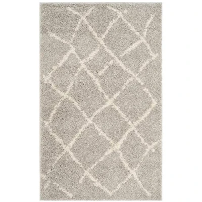 Abbildung von SAFAVIEH Zottelig Teppich für Wohnzimmer, Esszimmer, Schlafzimmer Berber Shag Collection, Kurzer Flor, Hellgrau und Creme, 91 X 152 cm