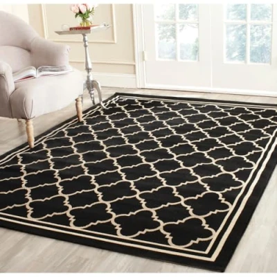 Abbildung von SAFAVIEH Geometrisch Teppich für Wohnzimmer, Esszimmer, Schlafzimmer Wasserdicht Courtyard Collection, Kurzer Flor, Schwarz und Beige, 122 X 170 cm