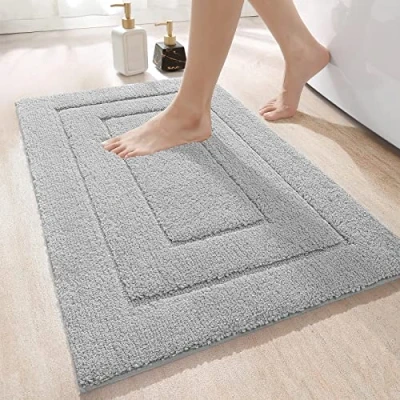 Abbildung von DEXI Badteppich rutschfeste,weicher Badezimmerteppich Wasserabsorbierend Badematte maschinenwaschbar Badvorleger für Dusche,Badewanne und Toilette Hellgrau,50 x 80 cm