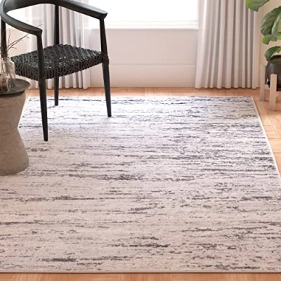 Abbildung von SAFAVIEH Modern Teppich für Wohnzimmer, Esszimmer, Schlafzimmer Amelia Collection, Kurzer Flor, Grau und Marine, 91 X 152 cm