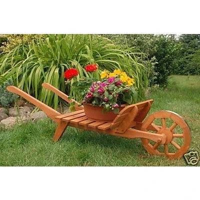 Abbildung von DSH DEKO SHOP HANNUSCH Gartenfigur Schubkarre Leiter