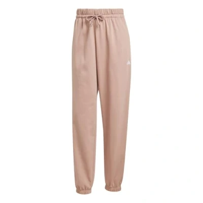Abbildung von adidas Sportswear Essentials Small LOGO Cuffed Jogginghose, Damen, Größe: XS, Warm clay/white