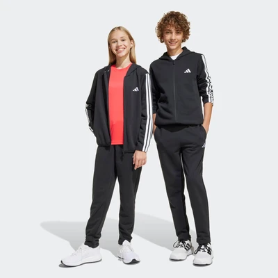 Abbildung von adidas Unisex Kinder ESSENTIALS TRACKSUIT, black/white, 7 8 Years