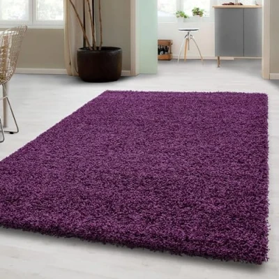 Abbildung von Carpetsale24 Shaggy Hochflor Teppich Wohnzimmer 250x350 (240x340 cm) Violett Modern Flauschiger Extra Weich, Pflegeleicht und Einfarbig für Schlafzimmer, Esszimmer Küche