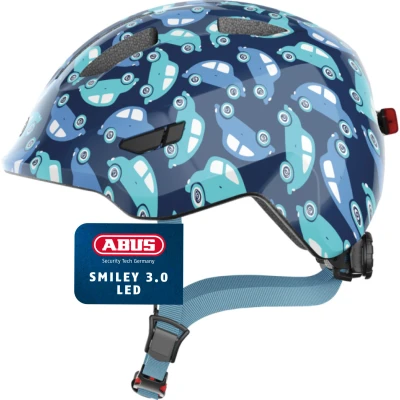 Abbildung von ABUS Kinderhelm Smiley 3.0 LED Fahrradhelm mit Licht tiefe Passform &amp; Platz für einen Zopf Mädchen und Jungs Blau Auto Muster, Größe M