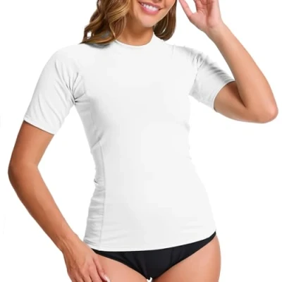 Abbildung von MEETWEE Damen Surf Rash Guard Sonnenschutz Badeanzug UV Schutz Shirt UPF 50+ Kurzarm Badeoberteil Schnell trocknendes Schwimm Sonnenschutzshirt für Wassersport.