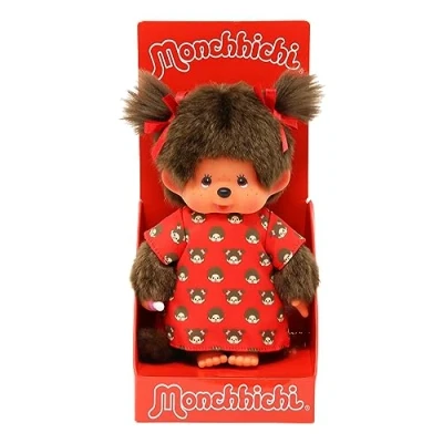 Abbildung von Monchhichi Plüschfigur Mädchen im Monchi Kleid 20 cm Puppe zwei rote Zöpfchen