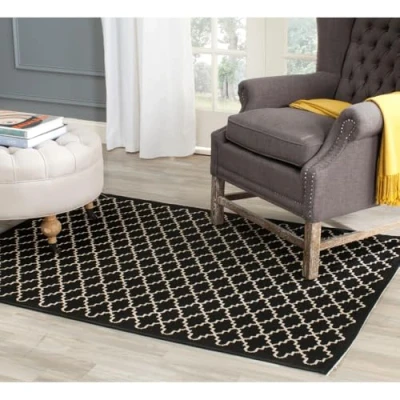 Abbildung von SAFAVIEH Geometrisch Teppich für Wohnzimmer, Esszimmer, Schlafzimmer Wasserdicht Courtyard Collection, Kurzer Flor, Schwarz und Beige, 122 X 170 cm