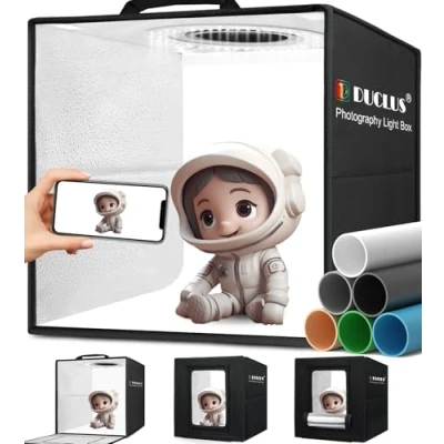 Abbildung von DUCLUS Fotobox, 25x25 cm Fotostudio Set für Produktfotografie, Faltbare Mini Lichtbox mit 96 LEDs, 6 wasserdichte PVC Hintergründe kleine Gegenstände