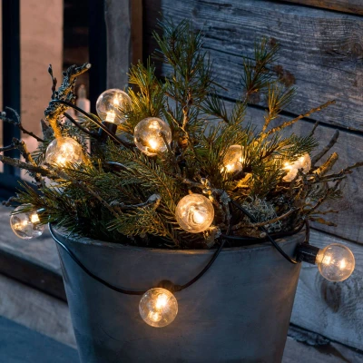 Abbildung von KONSTSMIDE LED Lichterkette, 10 flammig, Biergartenkette, klare Birnen / 20 bernsteinfarbene Dioden