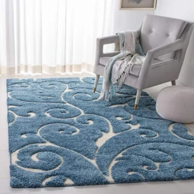 Abbildung von SAFAVIEH Zottelig Teppich für Wohnzimmer, Esszimmer, Schlafzimmer Florida Shag Collection, Hoher Flor, Hellblau und Creme, 122 X 183 cm