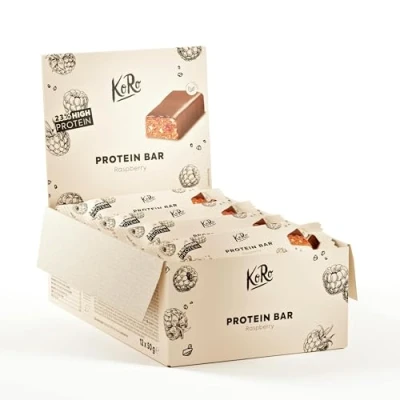Abbildung von KoRo Veganer Bio Proteinriegel Raspberry 12 x 50 g mit gefriergetrockneten Himbeeren Umhüllt dunkler Schokolade Hoher Ballaststoff und Proteingehalt