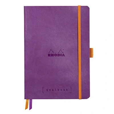Abbildung von Rhodia 117770C Notizheft Goalbook (DIN A5, 14,8 x 21 cm, kariert, praktisch und trendige, mit weichem Deckel, 90g, elfenbeinfarbigem Papier, 120 Blatt, Gummizug, Lesezeichen) 1 Stück, Violett