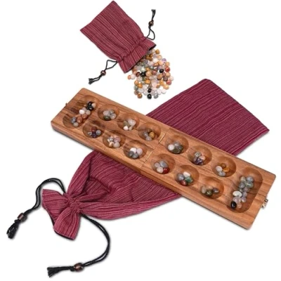 Abbildung von LOGOPLAY Kalaha Spiel mit Metallverschluss Gold für 2 Spieler und Großem Stoffbeutel Spielfeld 14 x 49 cm Hus Bao Edelsteinen