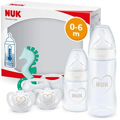 Abbildung von NUK First Choice+ Neugeborene Babyflaschen Set 06 Monate 2 x Babyflaschen, Genius Silikon Schnuller &amp; Beißring Anti Colic Ventil BPA frei Herz (neutral) 5 Stück