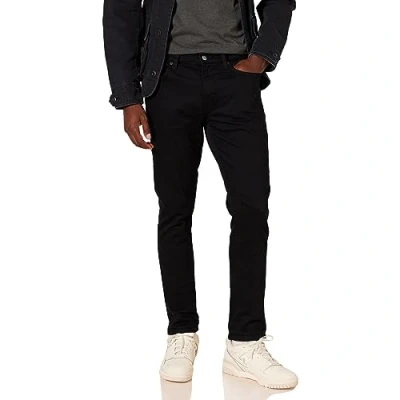 Abbildung von Amazon Essentials Herren Stretchjeans, Skinny Passform, Schwarz, 36W / 33L