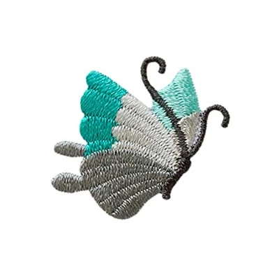 Abbildung von Monoquick Bügelbild Aufnäher Patch Applikation zum Aufbügeln Schmetterling grau türkis 3,0 x 2,5 cm