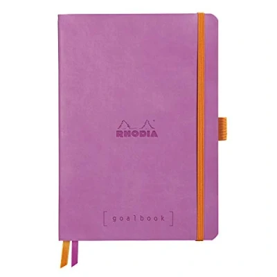 Abbildung von Rhodia 117771C Notizheft Goalbook (DIN A5, 14,8 x 21 cm, kariert, praktisch und trendige, mit weichem Deckel, 90g, elfenbeinfarbigem Papier, 120 Blatt, Gummizug, Lesezeichen) 1 Stück, Lila