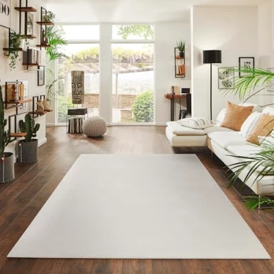Abbildung von Fashion4Home Teppich Wohnzimmer Einfarbig Teppich, Uni fürs Kinderzimmer, Schlafzimmer, Arbeitszimmer, Büro, Flur und Küche Kurzflor Cream Weiß, Größe: 120x170 cm