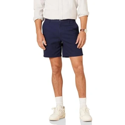 Abbildung von Amazon Essentials Herren 18 cm Lange Stretch Chinohose mit schmaler Passform, Marineblau, 29W