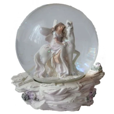 Abbildung von Glimmerkugel / Schneekugel mit Elfe an Einhorn stehend