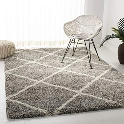 Abbildung von SAFAVIEH Zottelig Teppich für Wohnzimmer, Esszimmer, Schlafzimmer Hudson Shag Collection, Hoher Flor, Grau und Elfenbein, 155 X 229 cm