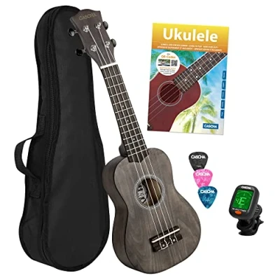 Abbildung von CASCHA Sopran Ukulele Set für Kinder und Erwachsene I Starter Kit mit 3 Plektren Tasche Lehrbuch Lernvideos über QR Code Stimmgerät Aquila Saiten Nylon Kleine Hawaii Gitarre Schwarz